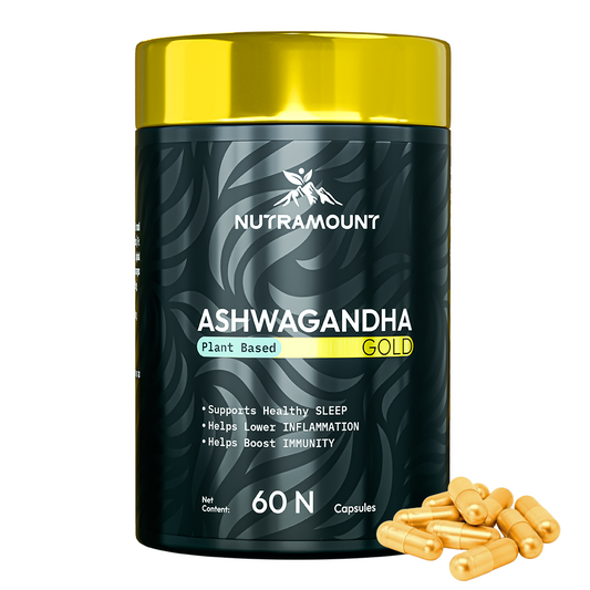 A black and gold bottle of Nutramount Ashwagandha Gold plant-based capsules, with a small pile of gold capsules next to it. The label lists benefits such as supporting healthy sleep, lowering inflammation, and boosting immunity.