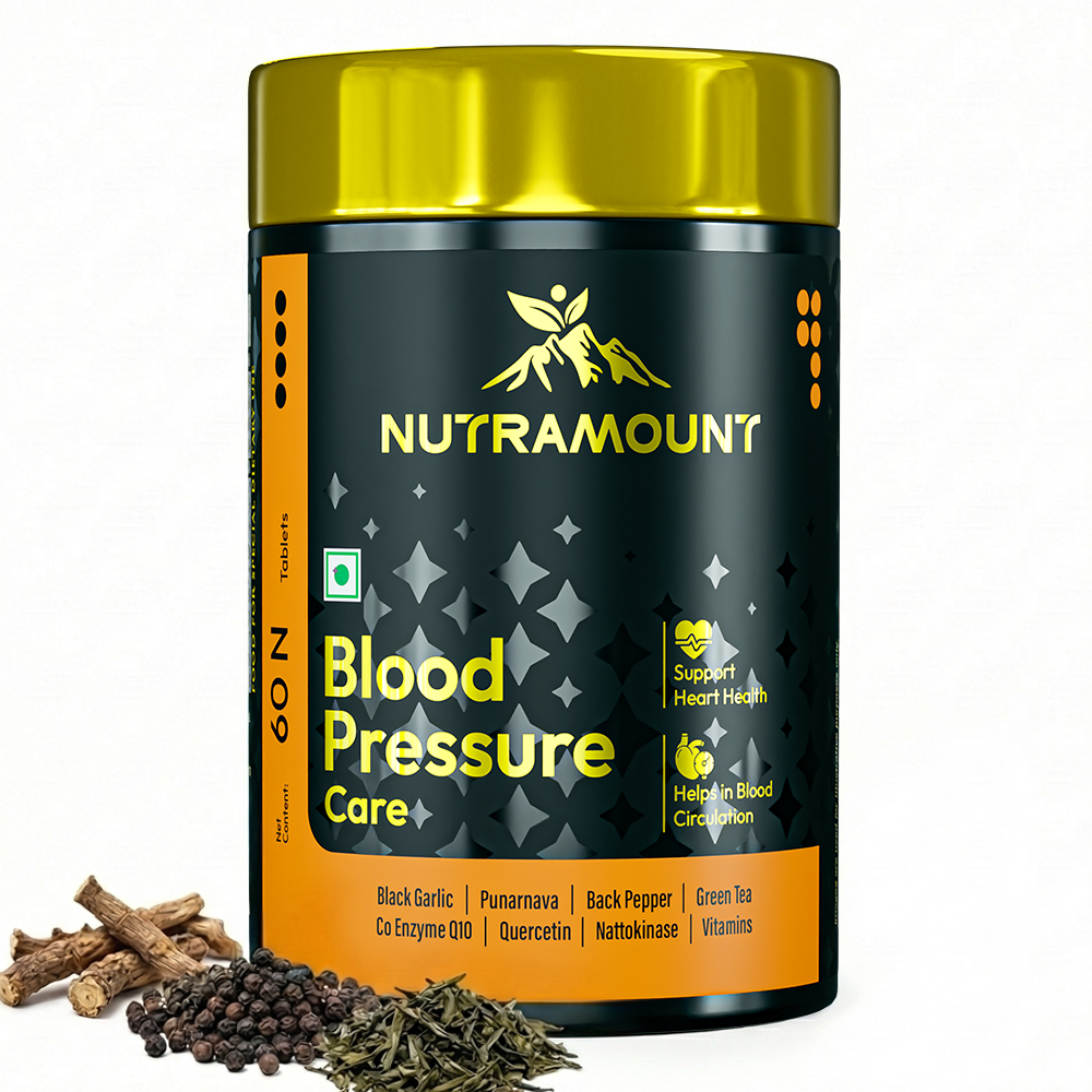 Nutramount Blood Pressure Care supplement bottle displayed with black pepper, green tea leaves, and herbal roots, featuring key ingredients like Black Garlic and Coenzyme Q10 to support heart health and blood circulation.