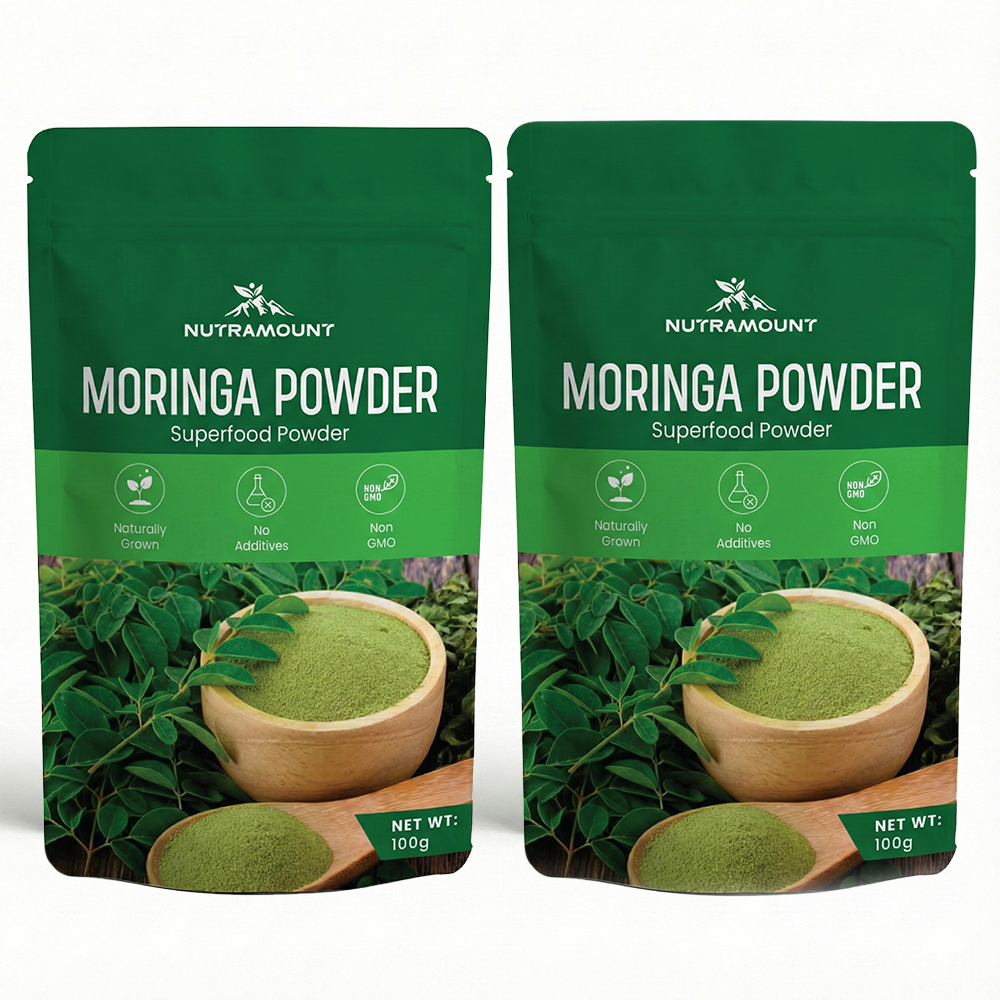 Two identical green pouches of Nutramount Moringa Superfood Powder standing side by side.