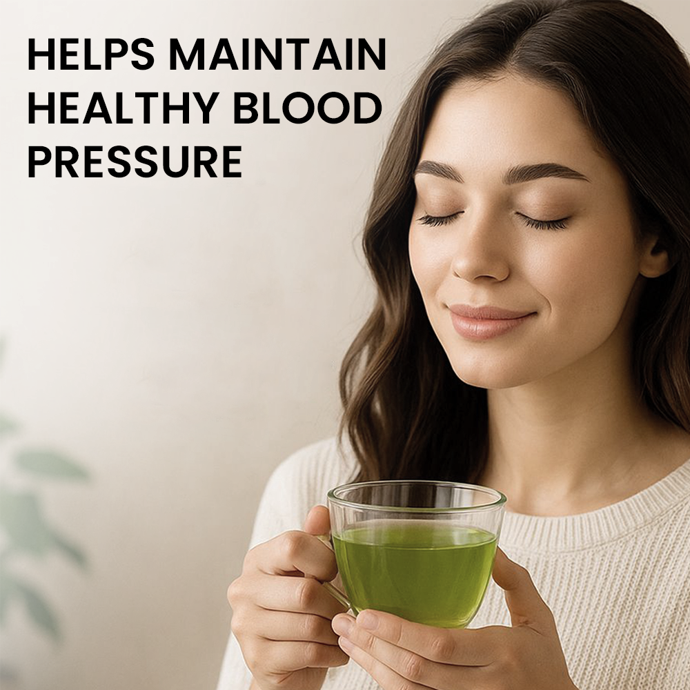 featuring a smiling woman with her eyes closed holding a clear cup of green tea. The text on the image reads, "HELPS MAINTAIN HEALTHY BLOOD PRESSURE."