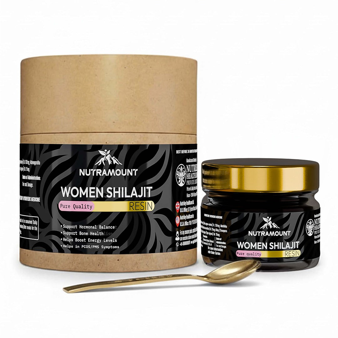 A product shot of the Nutramount Women Shilajit Resin jar, its outer cylindrical cardboard packaging, and a golden measuring spoon.